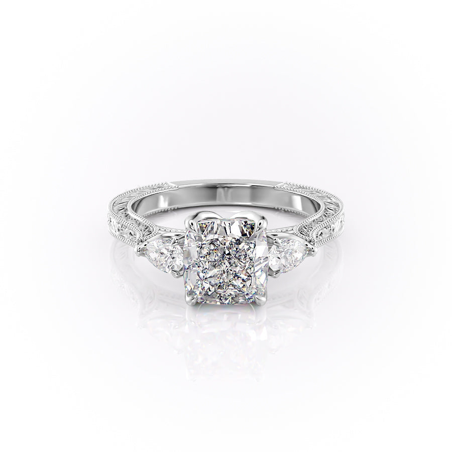 The Three Stone Sierra. A White Gold Vintage Engagement Ring Set With A 2ct Cushion Lab Grown Diamond. White Background.