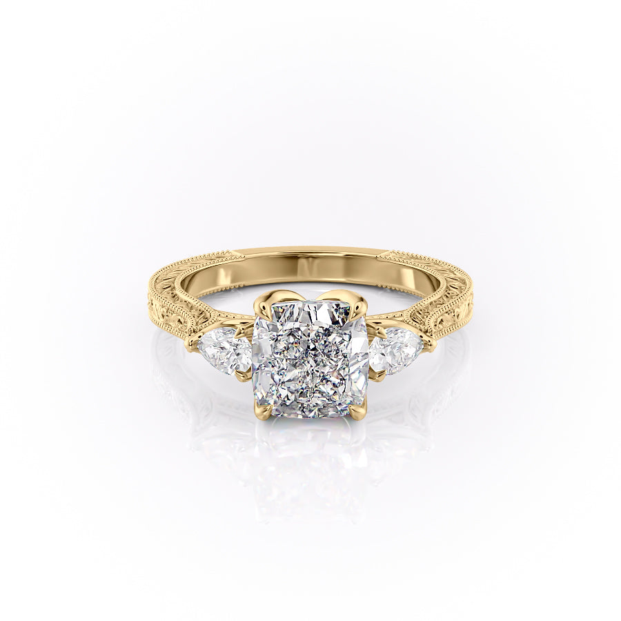 The Three Stone Sierra. A Yellow Gold Vintage Engagement Ring Set With A 2ct Cushion Lab Grown Diamond. White Background.
