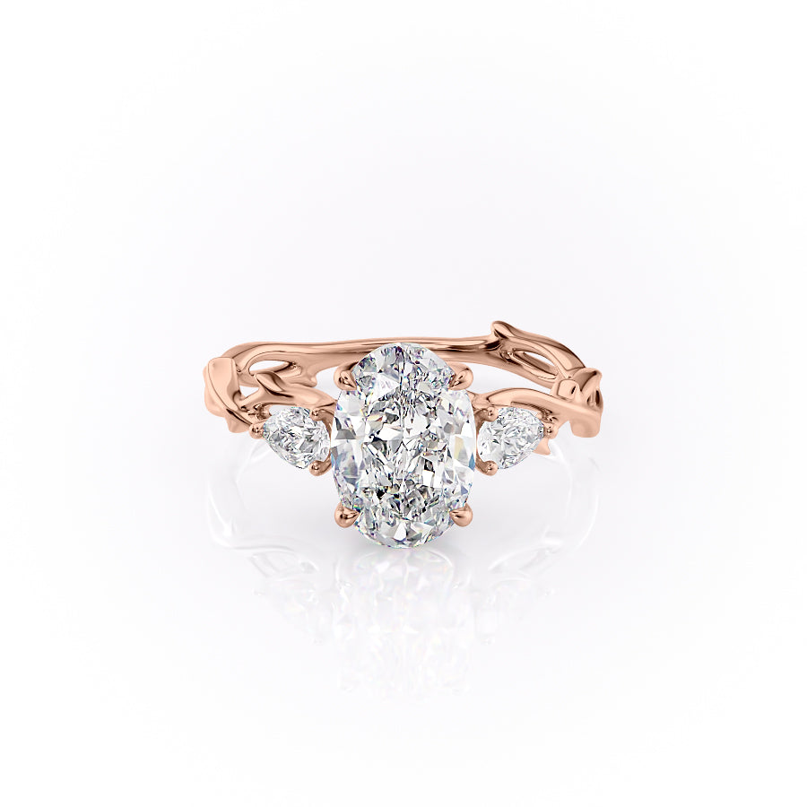 The Three Stone Twig. A Rose Gold Nature Engagement Ring Set With A 2ct Oval Lab Grown Diamond. White Background.
