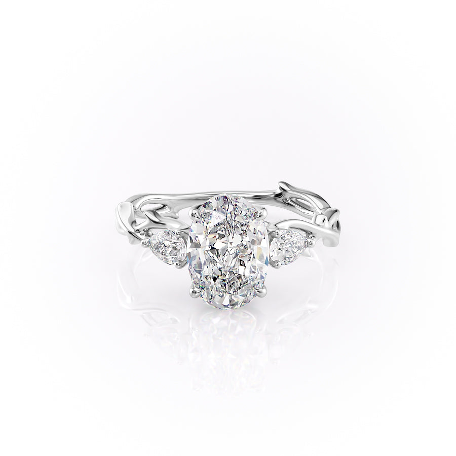 The Three Stone Twig. A White Gold Nature Engagement Ring Set With A 2ct Oval Lab Grown Diamond. White Background.
