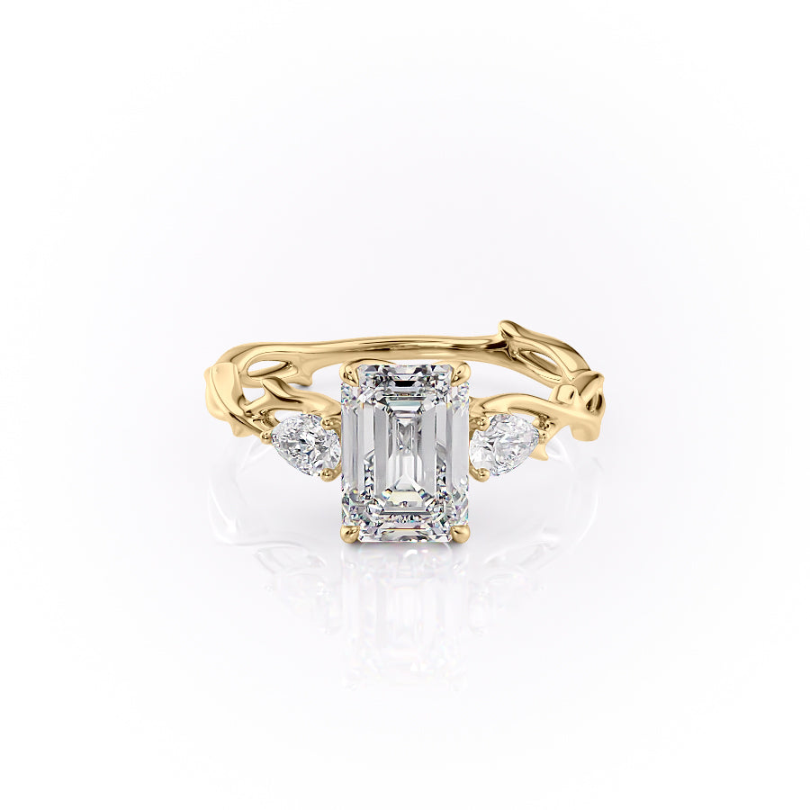 The Three Stone Twig. A Yellow Gold Nature Engagement Ring Set With A 2ct Emerald Lab Grown Diamond. White Background.