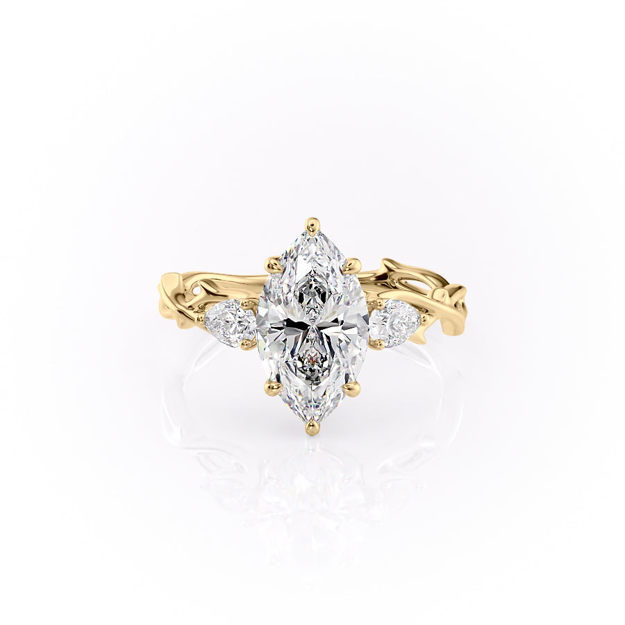 The Three Stone Twig. A Yellow Gold Nature Engagement Ring Set With A 2ct Marquise Lab Grown Diamond. White Background.