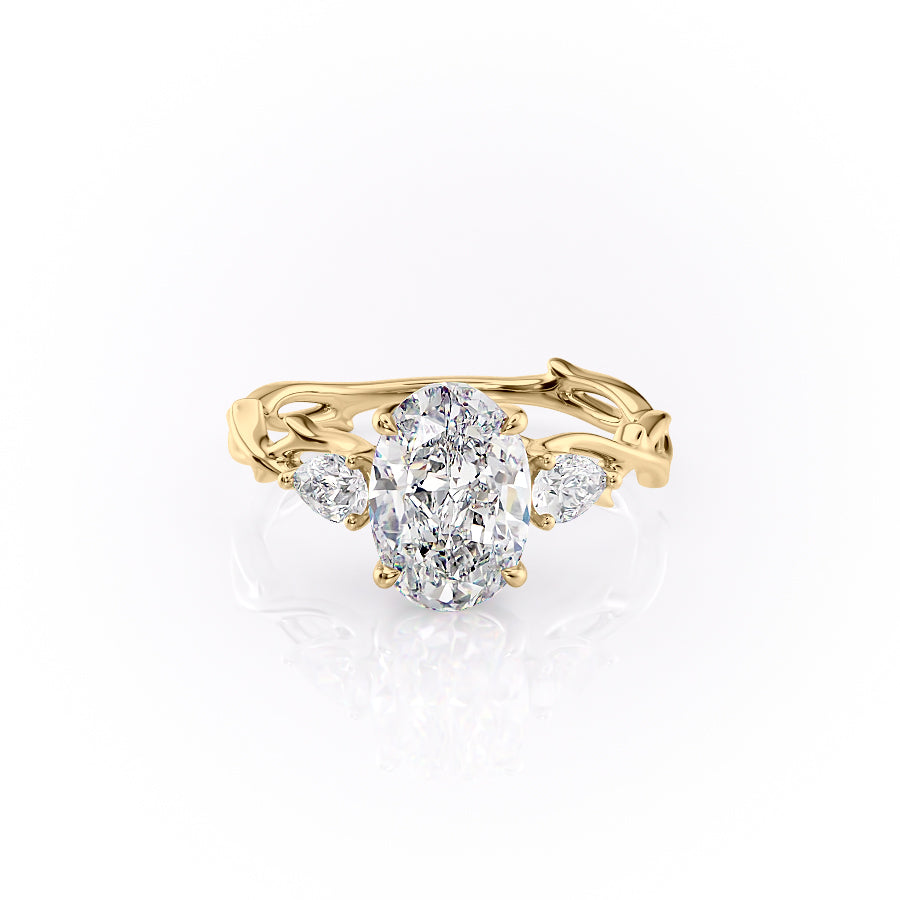 The Three Stone Twig. A Yellow Gold Nature Engagement Ring Set With A 2ct Oval Lab Grown Diamond. White Background.