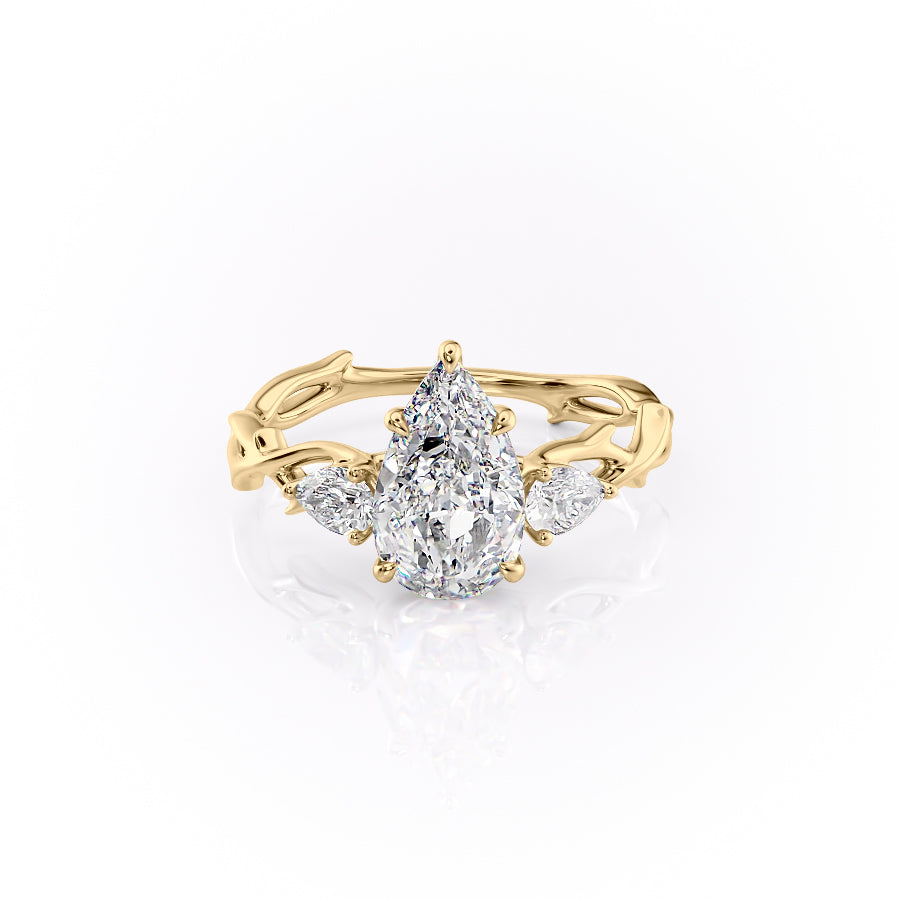 The Three Stone Twig. A Yellow Gold Nature Engagement Ring Set With A 2ct Pear Lab Grown Diamond. White Background.