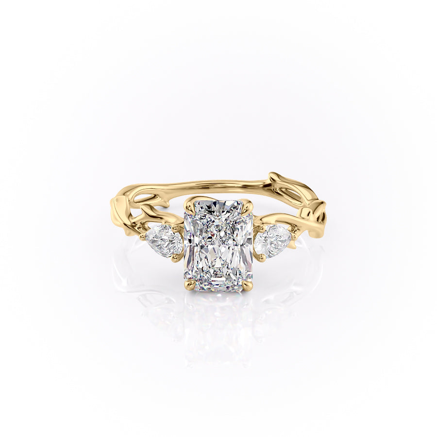 The Three Stone Twig. A Yellow Gold Nature Engagement Ring Set With A 2ct Radiant Lab Grown Diamond. White Background.