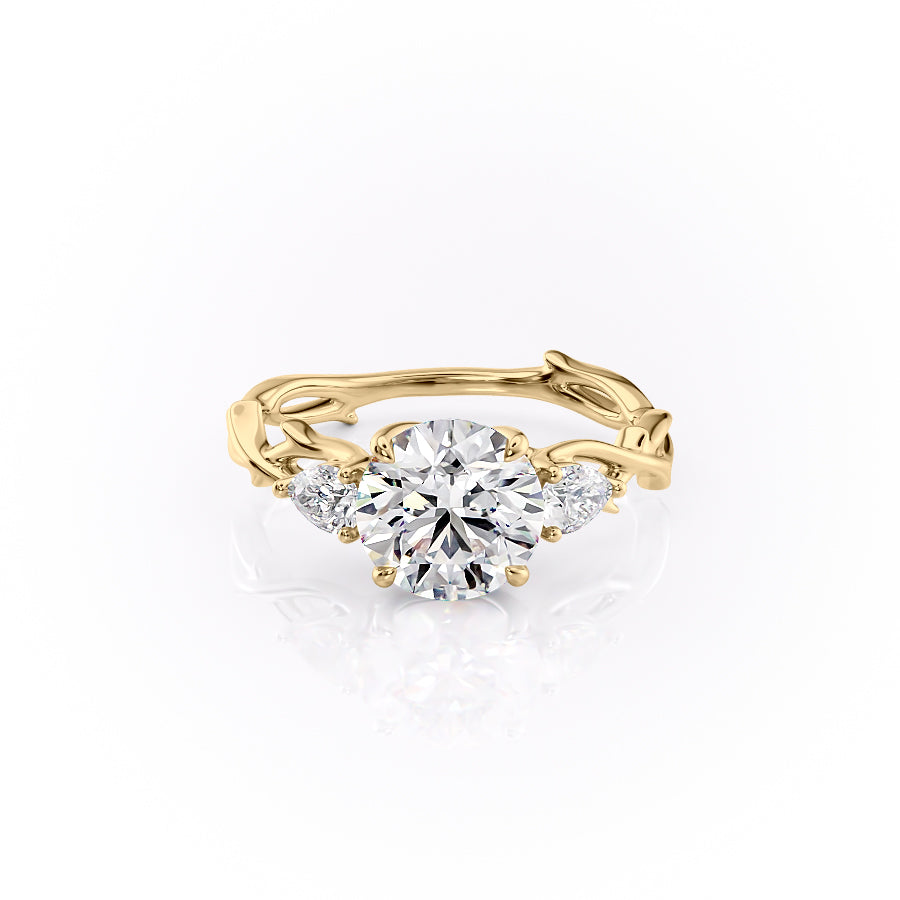 The Three Stone Twig. A Yellow Gold Nature Engagement Ring Set With A 2ct Round Lab Grown Diamond. White Background.
