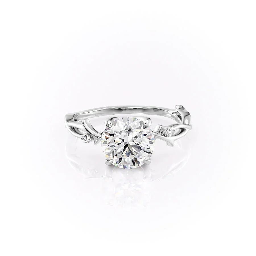 The Twig. A White Gold Solitaire, Nature, Three Stone, Side Stones Engagement Ring Set With A 2ct Round Lab Grown Diamond. White Background.