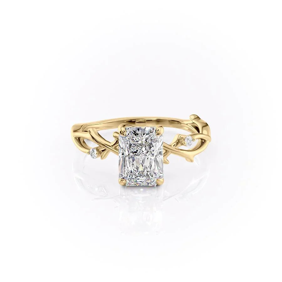 The Twig. A Yellow Gold Solitaire, Nature, Three Stone, Side Stones Engagement Ring Set With A 2ct Radiant Lab Grown Diamond. White Background.