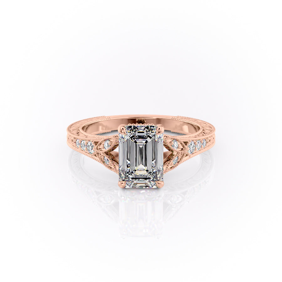 The Violet. A Rose Gold Vintage, Side Stones Engagement Ring Set With A 2ct Emerald Lab Grown Diamond. White Background.