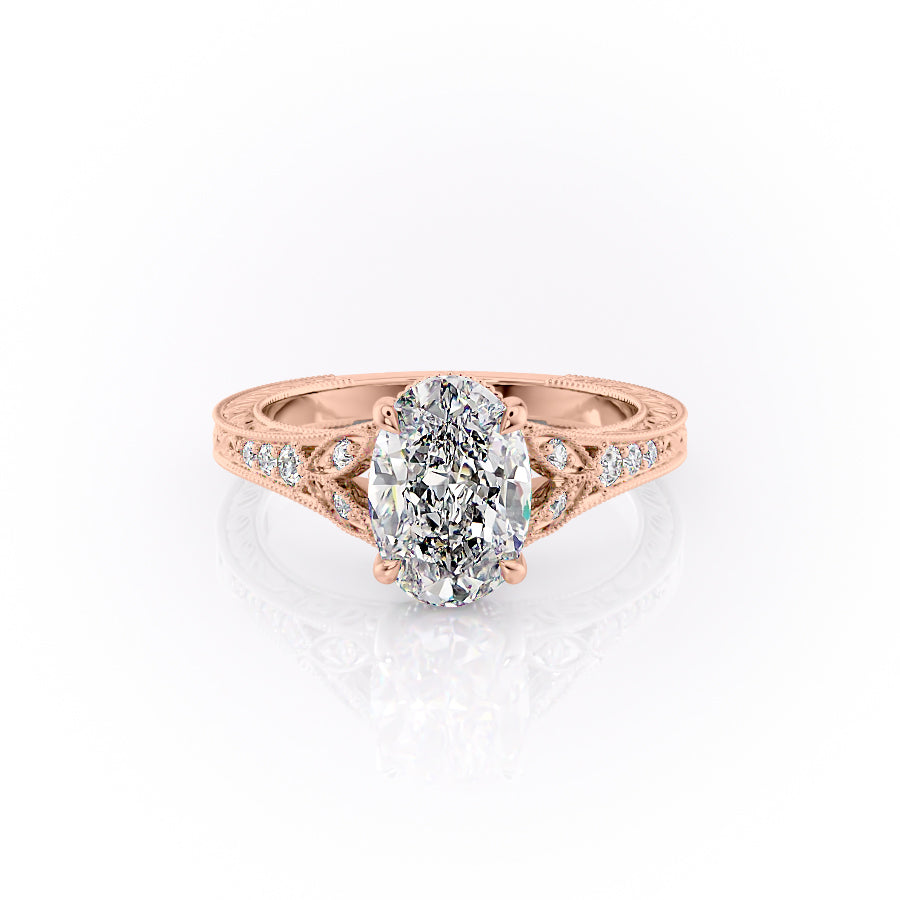 The Violet. A Rose Gold Vintage, Side Stones Engagement Ring Set With A 2ct Oval Lab Grown Diamond. White Background.