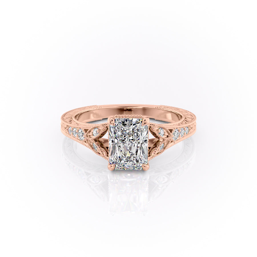 The Violet. A Rose Gold Vintage, Side Stones Engagement Ring Set With A 2ct Radiant Lab Grown Diamond. White Background.