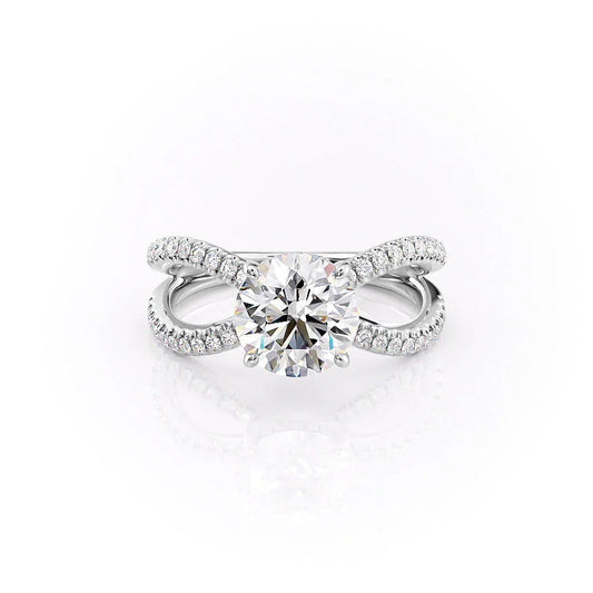 The Zoey. A White Gold Pave, Hidden Halo Engagement Ring Set With A 2ct Round Lab Grown Diamond. White Background.